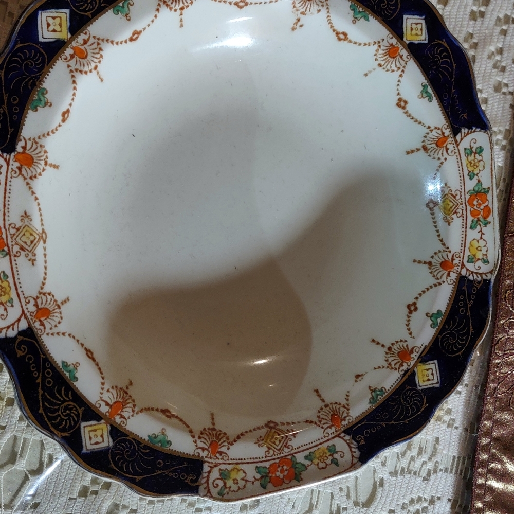 Myott Sons & Co, Derby.  Rimed bowls. Cobalt blue with orange and yellow flowers